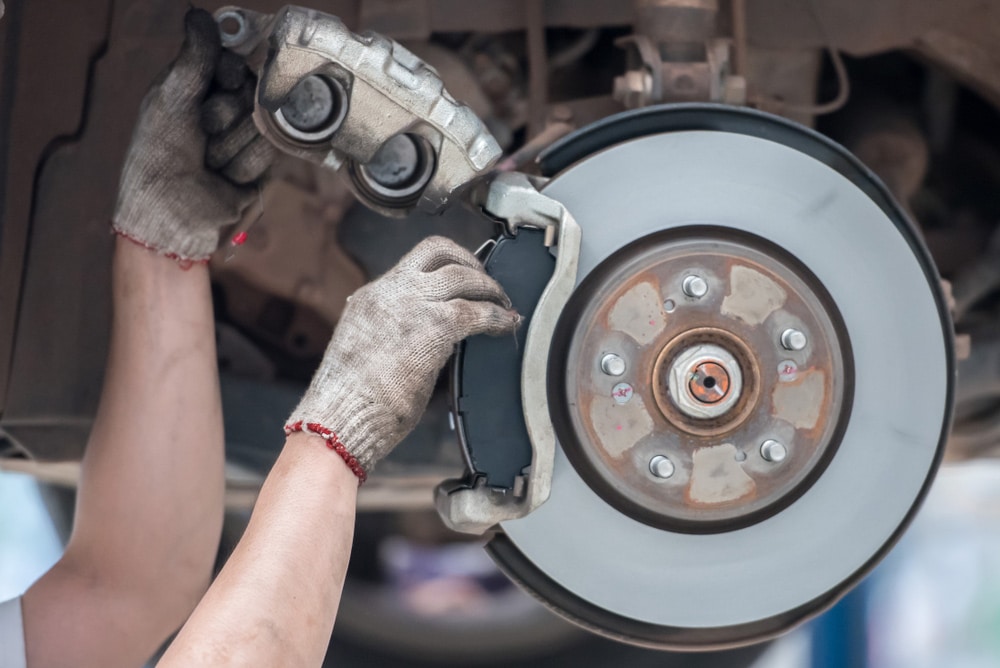 Mechanic Replacing Brake Pads